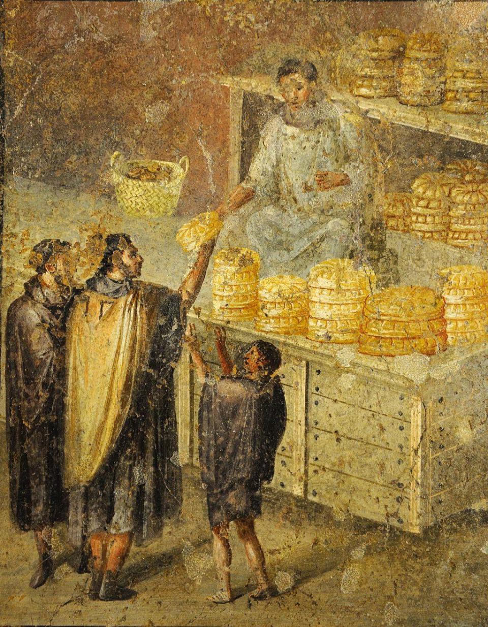 Panadero vendiendo pan