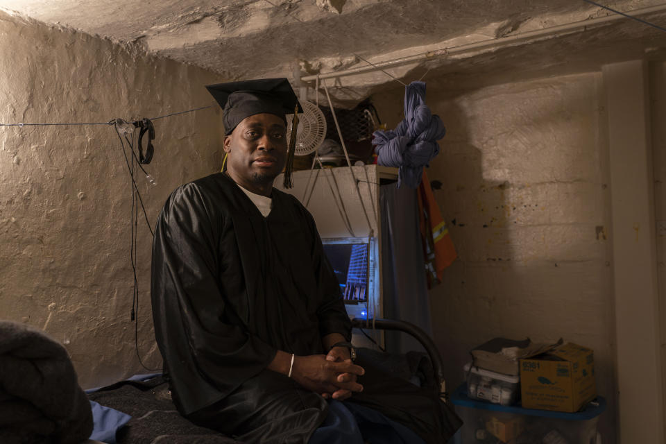 Sherman Dorsey, who earned a bachelor's degree in communications through the Transforming Outcomes Project at Sacramento State (TOPSS), sits for a portrait in his cell after a graduation ceremony at Folsom State Prison in Folsom, Calif., Thursday, May 25, 2023. (AP Photo/Jae C. Hong)