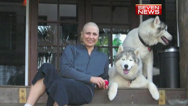 Sharon Cohrs with her two dogs during her battle with cancer five years ago.