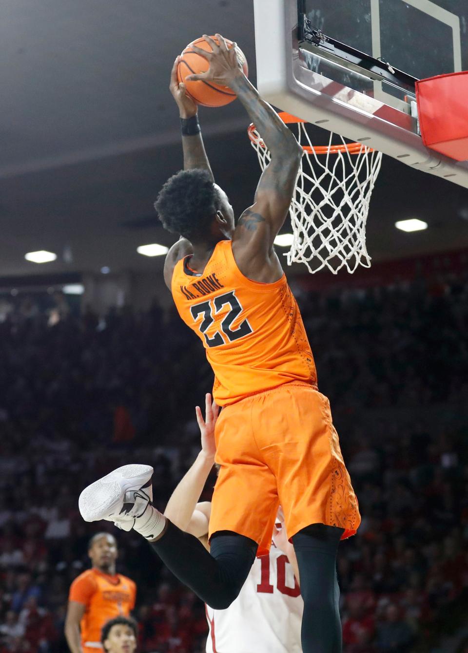 Oklahoma State's Kalib Boone (22) dunks the ball during the men's Bedlam college basketball game between the University of Oklahoma Sooners and the Oklahoma State Cowboys at Lloyd Noble Center in Norman, Okla., Tuesday, Jan.3, 2023. 