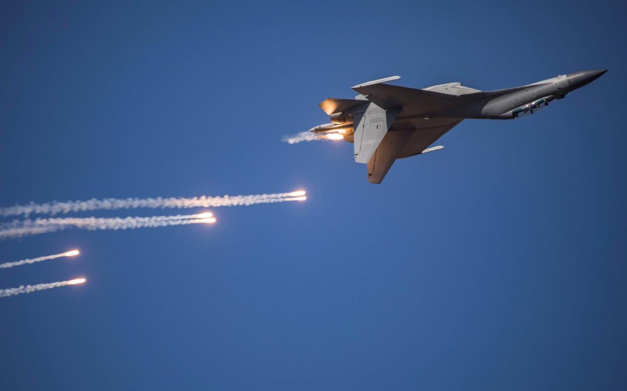 A J-16 fighter jet performing in the sky during the Chinese People's Liberation Army Air Force Aviation Open Day  - AFP