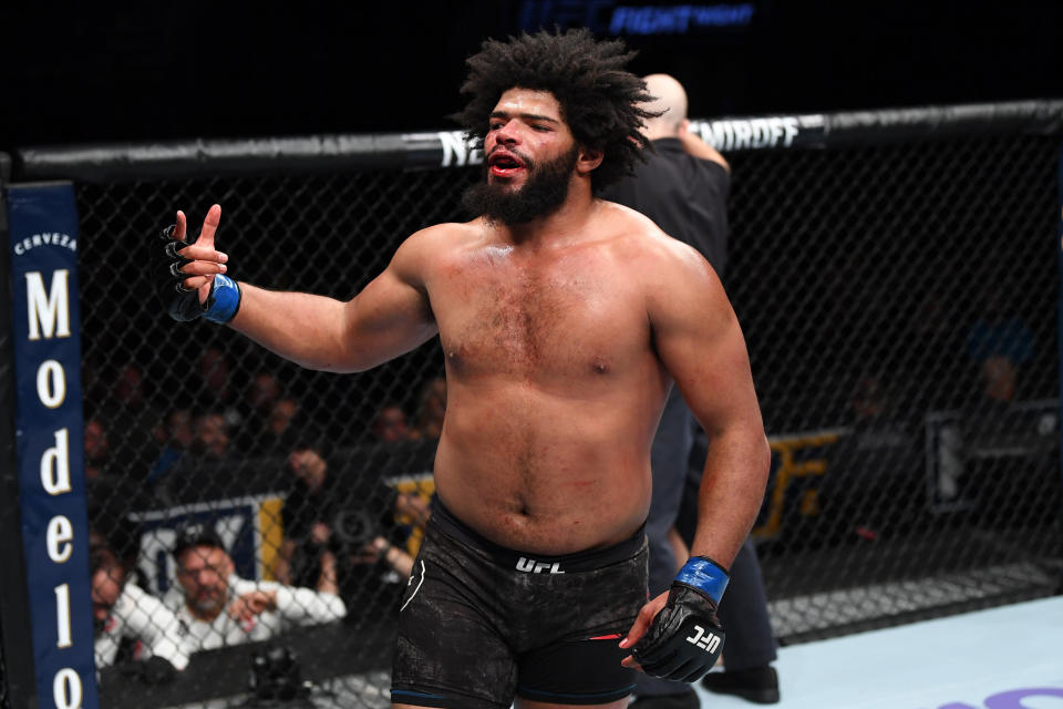 Juan Adams celebrates his victory over Chris De La Rocha in their heavyweight bout during the UFC Fight Night event at Fiserv Forum on December 15, 2018 in Milwaukee, Wisconsin.