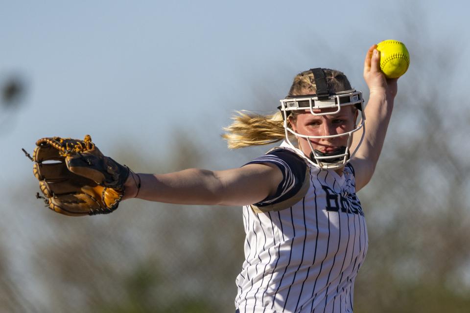 Tri-West Hendricks High School junior Audrey Lowry (1) delivers a pitch during an IHSAA softball game against Roncalli High School, Thursday, April 13, 2023, at Roncalli High School in Indianapolis.