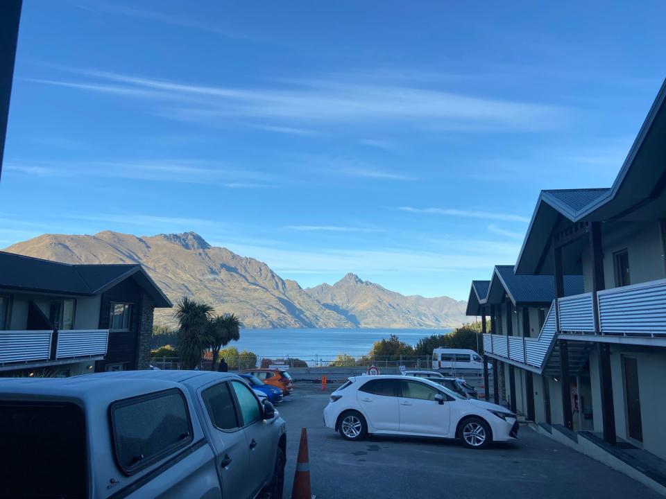 Parking lot at a hotel in front of mountain view in New Zealand