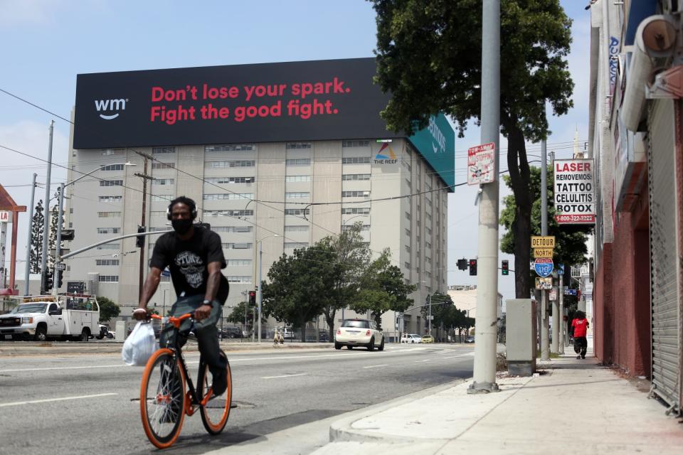 Three digital billboards loom over Washington Boulevard in Los Angeles City Councilman Curren Price's district.