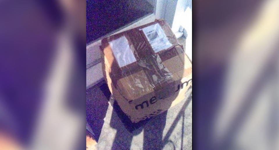 The photo the couple received indicating their parcel had been delivered. It turned out to be the wrong address. Source: Supplied