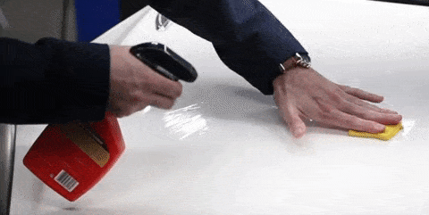 how to clay bar a car wiping on white hood