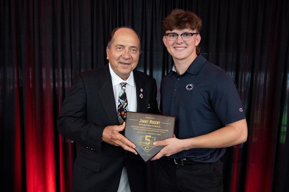 Major League Baseball Hall of Famer Johnny Bench gives Badin's Jimmy Nugent his award for top high school catcher in Ohio.