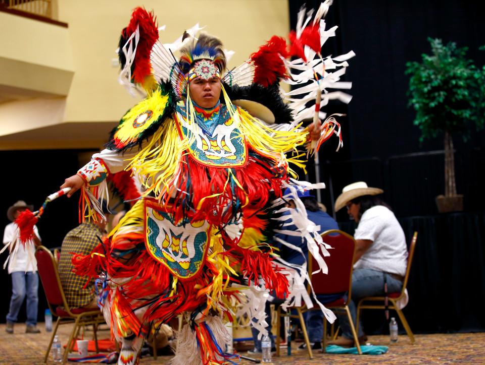 Daniel Scholfield, who is Potawatomi, dances during the Red Earth Festival at Grand Casino & Hotel Resort in Shawnee, Okla.,  Saturday, June 12, 2021.