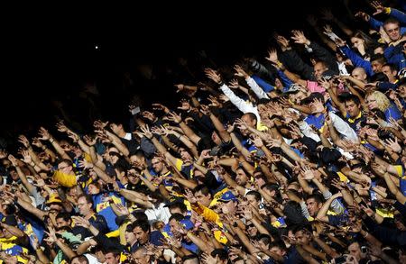 Boca Juniors' supporters cheer before their Argentine First Division soccer match against River Plate in Buenos Aires May 3, 2015. REUTERS/Marcos Brindicci