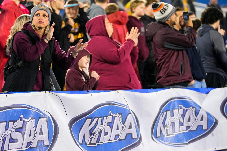 Cooper Jaguars fans clap for their team during the KHSAA Class 5A 2023 UK HealthCare Sports Medicine state finals football game between Cooper Jaguars and Bowling Green Purples on Saturday, Dec. 2, 2023, at Kroger Field in Lexington, Ky.