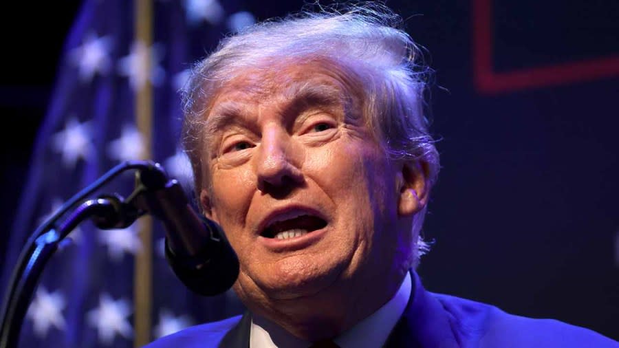 Former President Donald Trump speaks to guests gathered for an event at the Adler Theatre on March 13, 2023 in Davenport, Iowa. (Photo by Scott Olson/Getty Images)