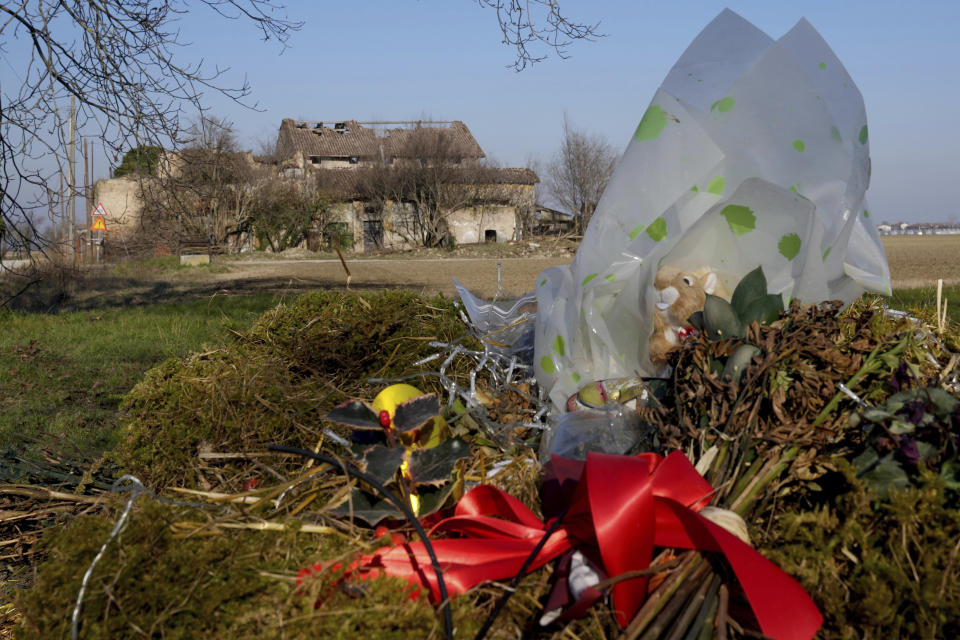 A stuffed toy squirrel and by now long dried flowers are left in tribute near the ruins of a farmhouse in Novellara, northern Italy, Friday, Feb. 10, 2023, where the body of Pakistani Saman Abbas was found in November 2021, nineteen months after she had disappeared. Courageous refusal by young immigrant women in Italy to submit to forced marriages sometimes carries a deadly price. In two murder trials this month, Italian prosecutors are seeking justice for Pakistani immigrant women allegedly killed because they refused marriages imposed by their parents. (AP Photo/Luca Bruno)