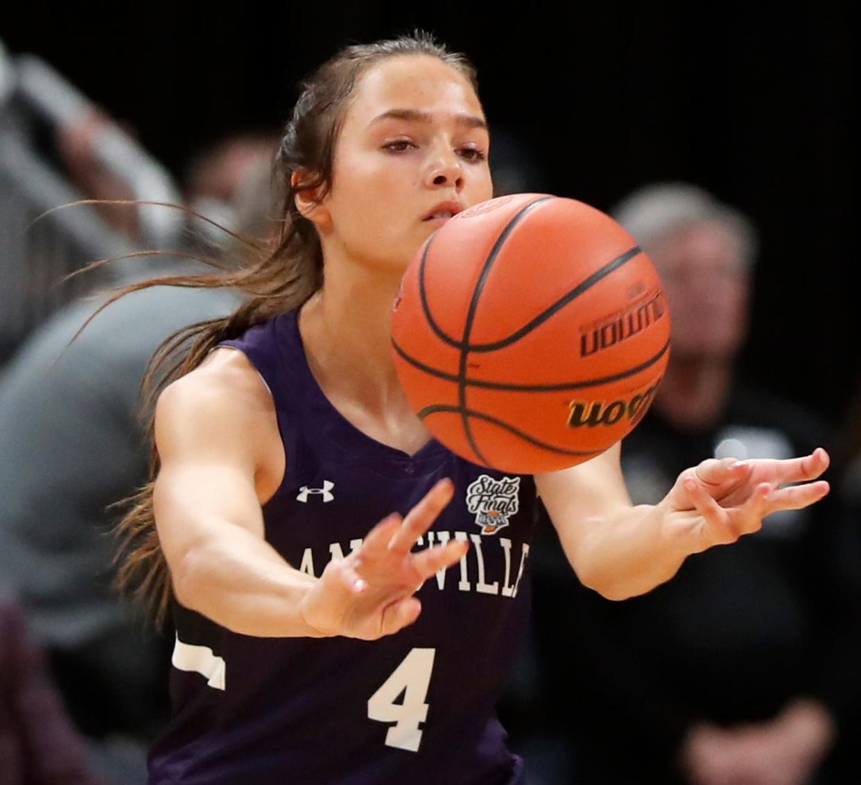 Lanesville Eagles guard Hadley Crosier (4) passes the ball during the IHSAA girls basketball Class 1A state championship against the Marquette Blazers, Saturday, Feb. 24, 2024, at Gainbridge Fieldhouse in Indianapolis. Lanesville Eagles won 51-43.