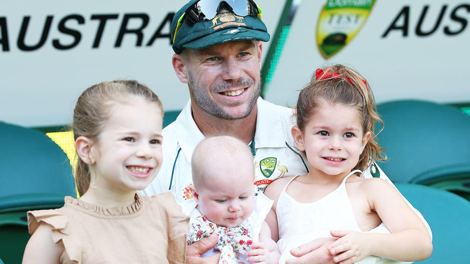 David Warner, pictured here with his daughters after a Test match in 2019.