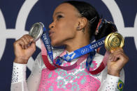 FILE - Rebeca Andrade, of Brazil, poses with her gold medal for vault and silver medal for all-round in artistic gymnastics at the 2020 Summer Olympics, Monday, Aug. 2, 2021, in Tokyo, Japan. (AP Photo/Ashley Landis, File)