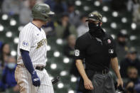 Milwaukee Brewers' Travis Shaw, left, argues with umpire Chris Segal during the fourth inning of the team's baseball game against the Atlanta Braves on Saturday, May 15, 2021, in Milwaukee. Shaw was ejected. (AP Photo/Aaron Gash)