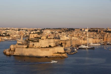 A boat sails past the medieval Fort Saint Angelo in Vittoriosa in Valletta's Grand Harbour June 17, 2012. REUTERS/Darrin Zammit Lupi
