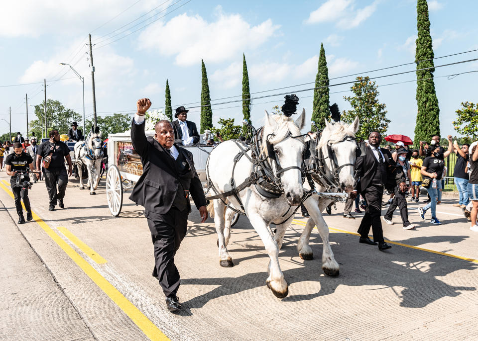 A horse-drawn carriage brought Floyd’s body into the cemetery on June 9. “It felt like a state funeral,” Roye said. “It felt like they were sending him off with the newfound persona that he had been catapulted into, and this was one of the ways to honor what he became. It felt right.” | Ruddy Roye for TIME