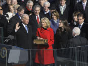 Vice President-elect Joe Biden, with his wife Jill at his side, takes the oath of office from Justice John Paul Stevens, as his wife holds the Bible at the U.S. Capitol in Washington, Tuesday, Jan. 20, 2009. (AP Photo/Elise Amendola)