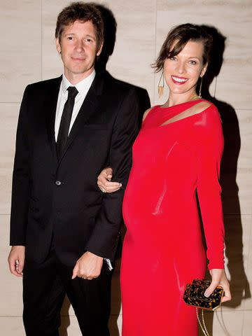 <p>Kevin Tachman/Getty </p> Paul W.S. Anderson and Milla Jovovich attend amfAR LA Inspiration Gala honoring Tom Ford on October 29, 2014 in Hollywood, California.