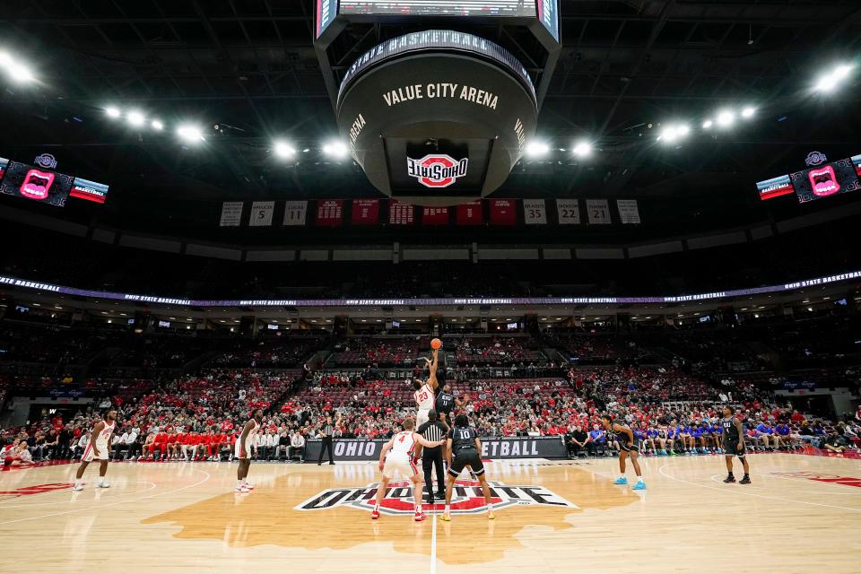 Nov 16, 2022; Columbus, OH, USA;  Ohio State Buckeyes forward Zed Key (23) takes the opening tip off against Eastern Illinois Panthers center Nick Ellington (11) during the first half of the NCAA men's basketball game at Value City Arena. Mandatory Credit: Adam Cairns-The Columbus Dispatch