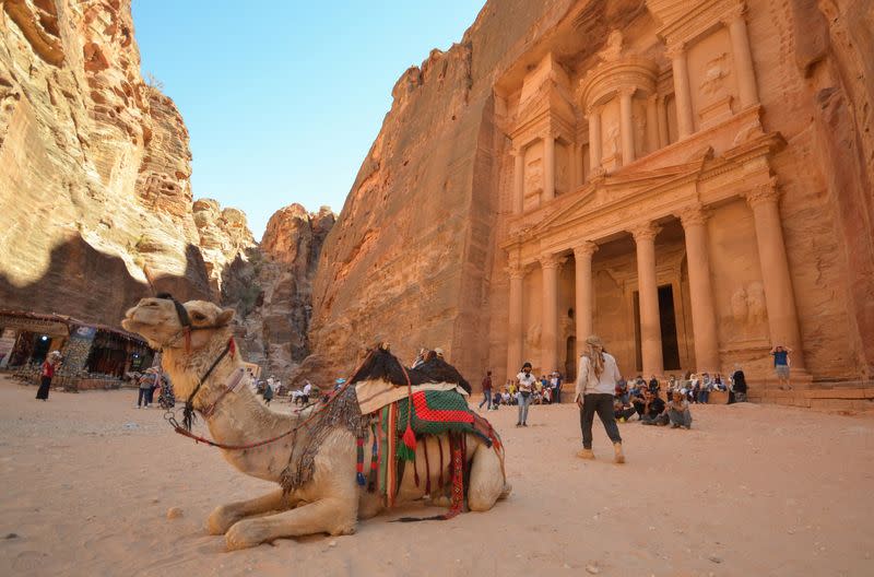 FILE PHOTO: Tourists gather in front of the treasury site in the ancient city of Petra