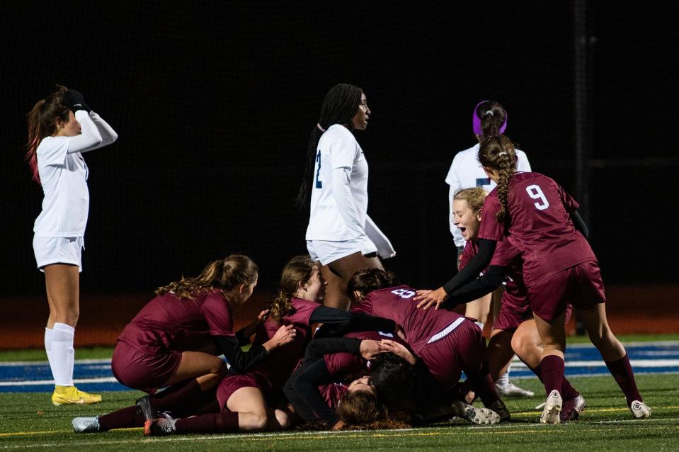 O'Neill celebrate their win during the girls Class B subregional soccer game in Wallkill, NY on Wednesday, November 1, 2023. O'Neill defeated Briarcliff in double overtime 3-2. KELLY MARSH/FOR THE TIMES HERALD-RECORD