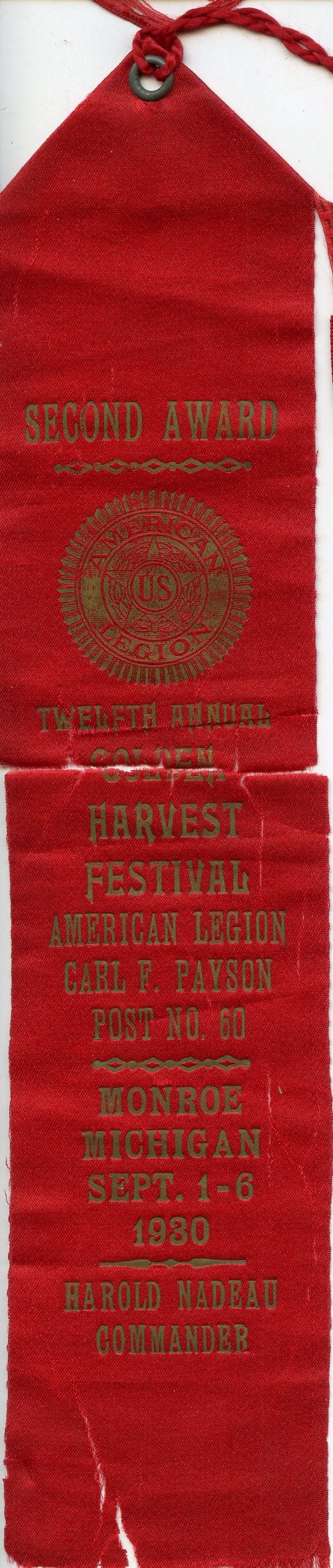 A ribbon from the Harvest Festival that was held in the 1920's.