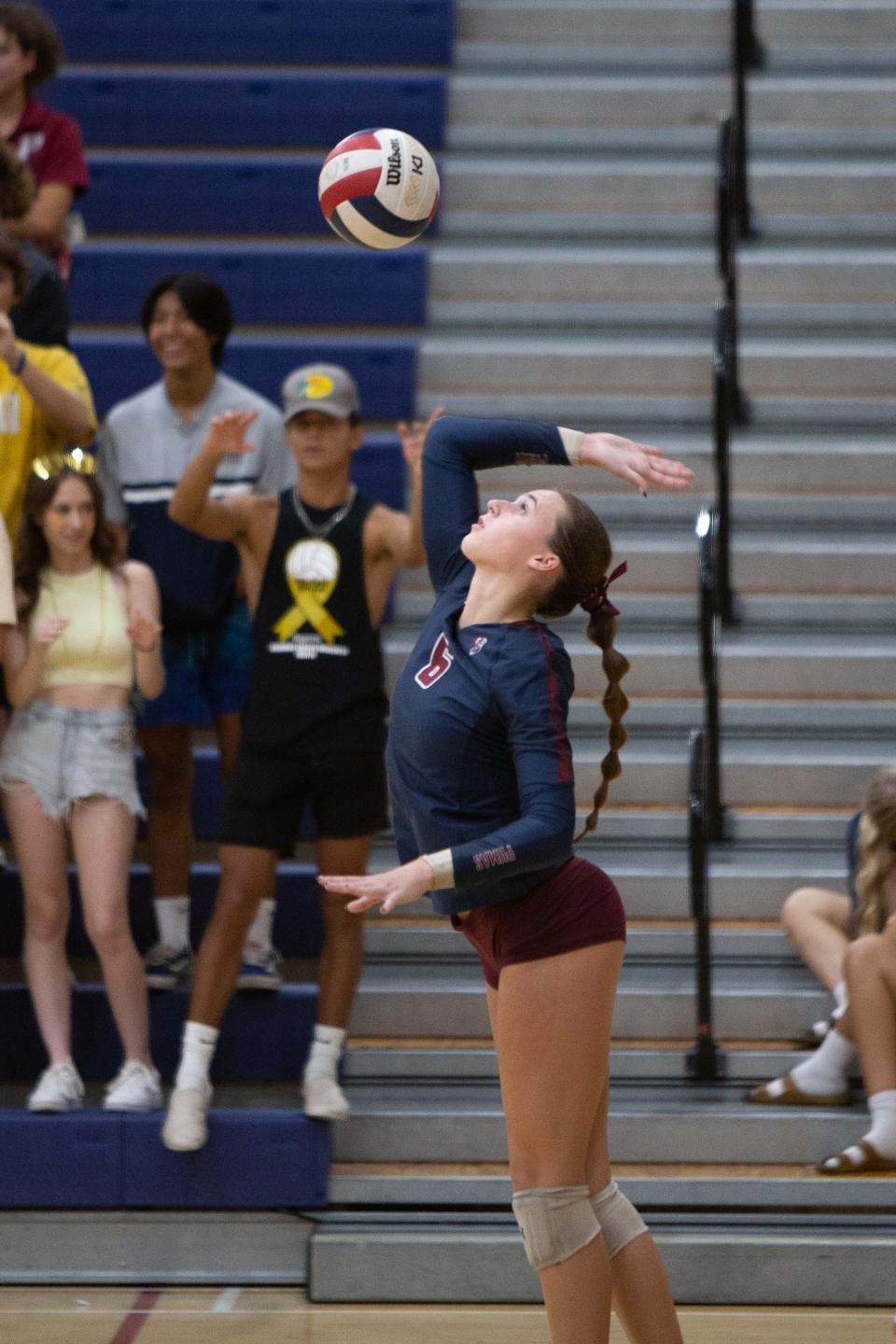 Perry's Avery Burks (6) serves during a game against Hamilton High School at Perry High School in Gilbert on Sept. 28, 2022.