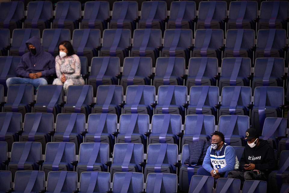 Friends and family of the Minnesota Timberwolves attend the game between the Minnesota Timberwolves and the Phoenix Suns at Target Center on February 28, 2021 in Minneapolis, Minnesota. This was the first game any fans were allowed into the arena. NOTE TO USER: User expressly acknowledges and agrees that, by downloading and or using this Photograph, user is consenting to the terms and conditions of the Getty Images License Agreement (Photo by Hannah Foslien/Getty Images)