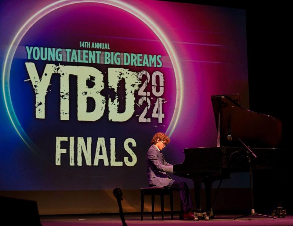 Gerry Ibarra, 16, of Terra Environmental Research Institute, performs his musical composition, “Rat Race,” with the showmanship of a young Elton John at the piano, during the finals of Young Talent Big Dreams 2024 on the Actors’ Playhouse stage at The Miracle Theatre in Coral Gables. Gerry won his Original Composition category and was judged Overall Grand Prize Winner at the competition on May 11, 2024.