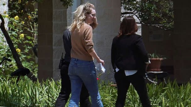 PHOTO: Theranos founder Elizabeth Holmes arrives to begin serving her prison sentence for defrauding investors in the failed blood-testing startup, at the Federal Prison Camp in Bryan, Texas, May 30, 2023. (Go Nakamura/Reuters)