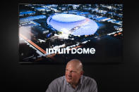 With a rendering of the proposed arena for the Los Angeles Clippers behind him, Clippers owner Steve Ballmer talks to a reporter during an interview with The Associated Press, Thursday, Sept. 16, 2021, in Los Angeles. (AP Photo/Jae C. Hong)