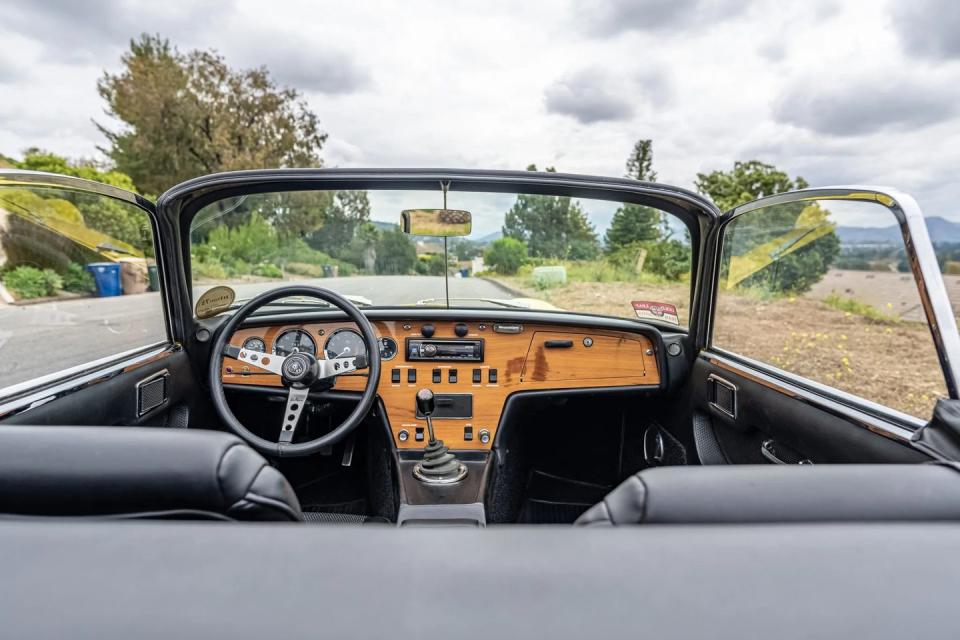 1972 lotus elan roadster interior dash with the top down