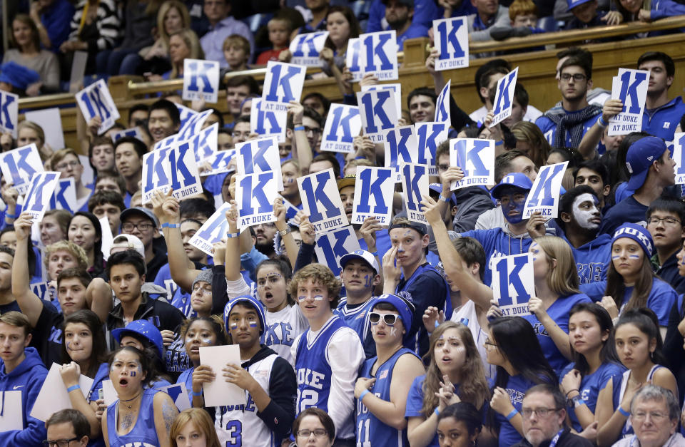 Students in the student section of a Duke basketball game were the target of racist tweets from a reporter. (AP Photo)