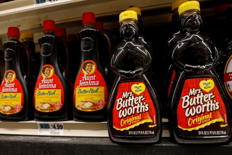 Bottles of Mrs. Butter-Worth's branded syrup are seen along side Aunt Jemima branded syrup on a store shelf in the Brooklyn borough of New York