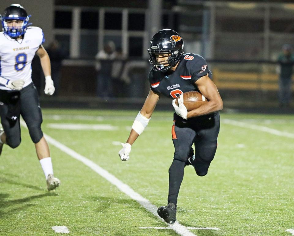 Mediapolis’ Anthony Isley carries the ball for the Bulldogs in their win over Durant.