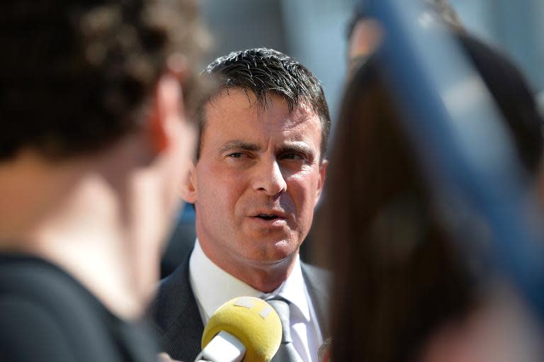 French Interior minister Manuel Valls, seen here during a visit to the Caribbean island of Guadeloupe on October 18, 2013, says claims a US spy agency monitored 70.3 million phone calls over a 30-day period as "shocking"