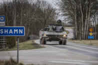 FILE - Members of Gotland's Regiment patrol in a tank, on a road in Visby, nothern Gotland, Sweden, Sunday Jan. 16 2022. Finland and Sweden have signaled their intention to join NATO over Russia’s war in Ukraine and things will move fast once they formally apply for membership in the world’s biggest security alliance. Russian President Vladimir Putin has already made clear that there would be consequences if the two Nordic countries join. (Karl Melander/TT News Agency via AP, File)