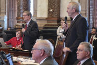 Kansas state Sens. Vic Miller, left, D-Topeka, and John Doll, R-Garden City, debate a proposed amendment to the Kansas Constitution on abortion, Wednesday, Jan. 29, 2020, at the Statehouse in Topeka, Kan. The amendment would overturn a Kansas Supreme Court decision protecting abortion rights, and Miller and Doll want to have such a measure on the ballot in the November general election instead of the August primary. (AP Photo/John Hanna)