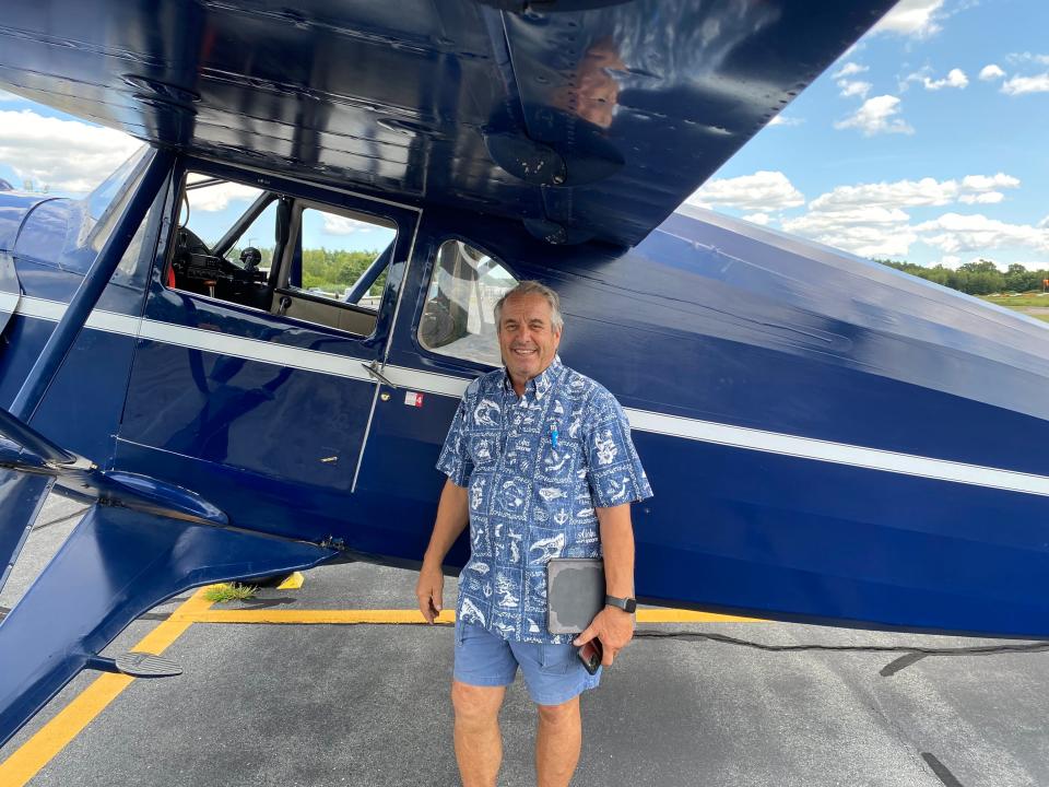 Chuck Wright, standing outside his plane on the tarmac at Taunton Municipal Airport on Wednesday, Aug. 2, 2023, is running for mayor of Taunton.