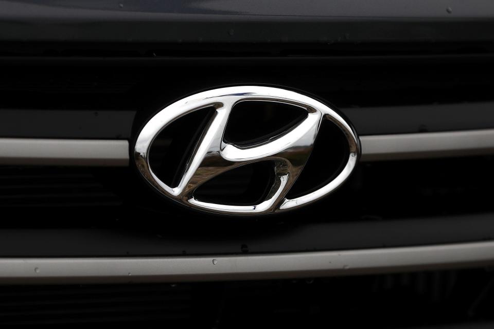 The Hyundai logo is displayed on a brand new Hyundai Santa Fe SUV at a Hyundai dealership on April 7, 2017 in Colma, California.