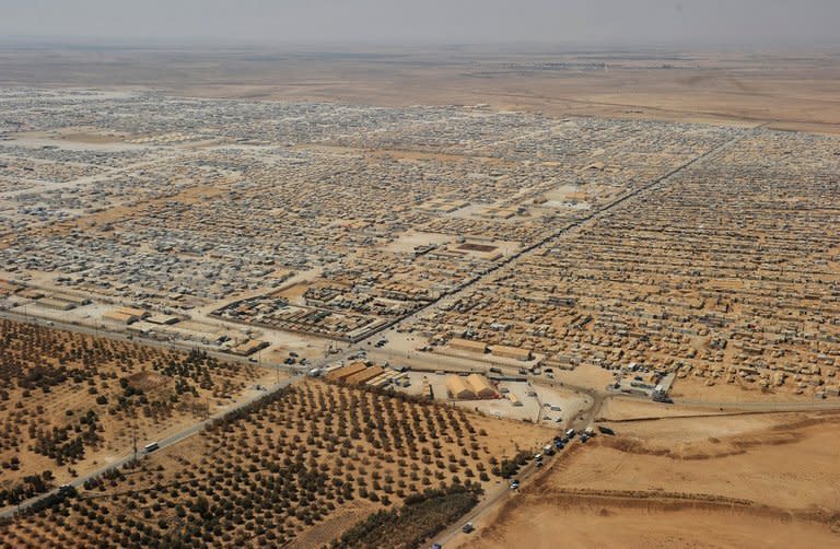 An aerial view of the Zaatari refugee camp on July 18, 2013 near the Jordanian city of Mafraq, some eight kilometers from the Jordanian-Syrian border. Jordanians were voting Tuesday in municipal elections with the impact of a massive influx of war refugees from neighbouring Syria on a struggling economy stoking voter resentment and apathy