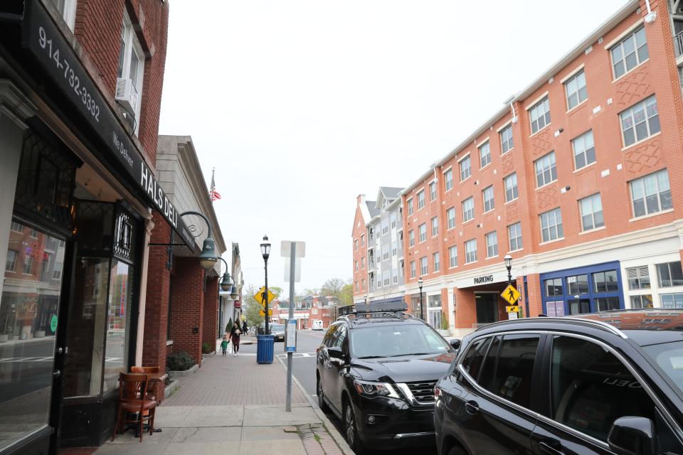 A view of the businesses and Avalon Harrison on Halstead Avenue in Harrison April 19, 2024.The Avalon Harrison, which has 143 apartment units in three residential buildings next to the train station, was a Metro-North led transit oriented development project completed in 2023.