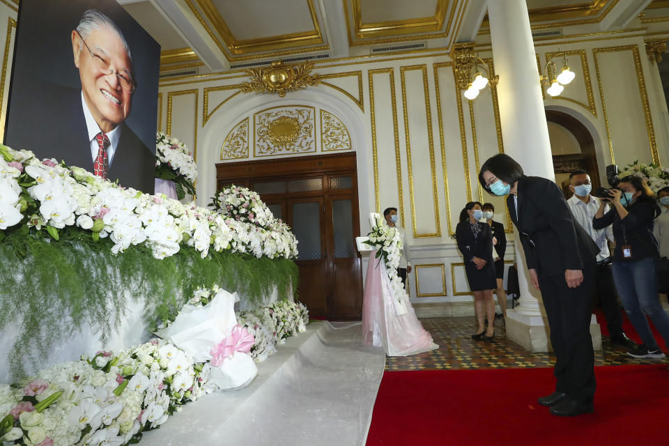 In this photo released by the Taiwan Presidential Office, Taiwan's President Tsai Ing-wen pays her respects at a memorial for former Taiwanese President Lee Teng-hui in Taipei, Taiwan, Saturday, Aug. 1, 2020. Lee, who brought direct elections and other democratic changes to the self-governed island despite missile launches and other fierce saber-rattling by China, died on Thursday at age 97. (Taiwan Presidential Office via AP)