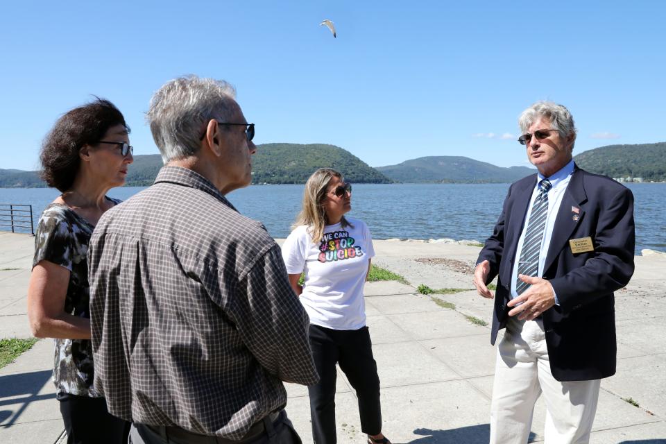 Lucille and Roy Ettere of Somers, whose daughter died by suicide, Maria Idoni, Hudson Valley/Westchester director for American Foundation for Suicide Prevention, and Assemblymember Chris Eachus chat after a press conference to call on the Bridge Authority to install suicide prevention fencing to five bridges in the Hudson Valley Sept. 14, 2023 in Peekskill.