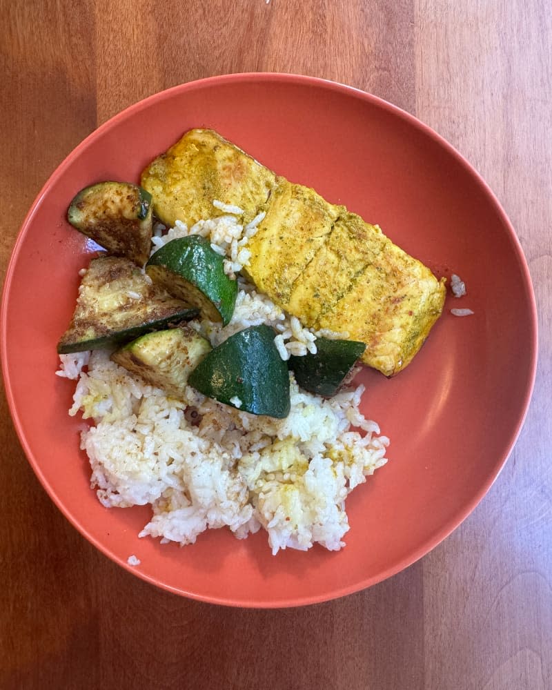 Cook Unity meal kit of salmon, rice and zucchini in bowl.