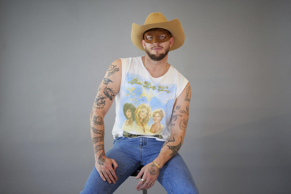 Country music artist Orville Peck poses for portraits on Wednesday, June 26, 2024, in New York to promote his third album "Stampede." (Photo by Matt Licari/Invision/AP)