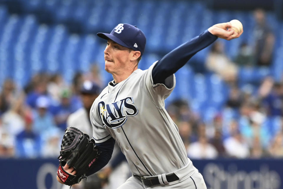 Tampa Bay Rays' Ryan Yarbrough pitches to a Toronto Blue Jays batter during the second inning of a baseball game Thursday, June 30, 2022, in Toronto. (Jon Blacker/The Canadian Press via AP)